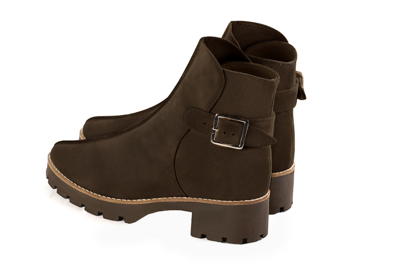 Dark brown women's ankle boots with buckles at the back. Round toe. Low rubber soles. Rear view - Florence KOOIJMAN